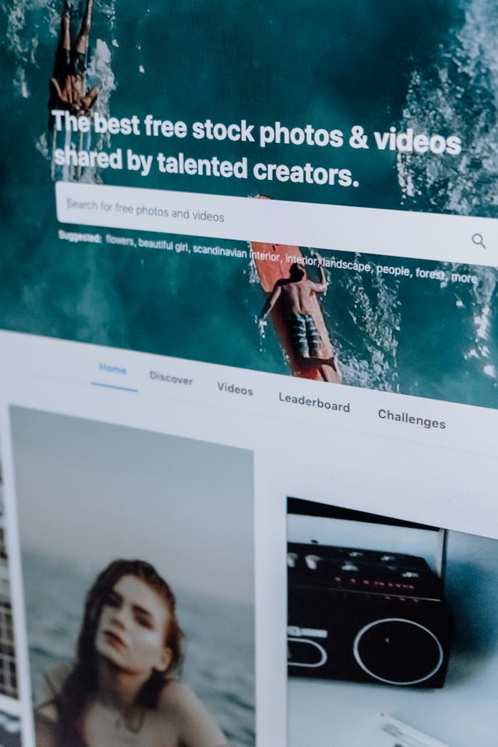 services-03 Close-up of a computer screen showing a stock photo website interface with multiple images.